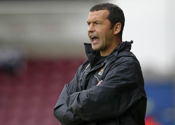 Colin Calderwood was manager of Northampton when they last beat Posh. He'll be in the dugout again this weekend as Jon Brady's number two. (Photo by Pete Norton/Getty Images)