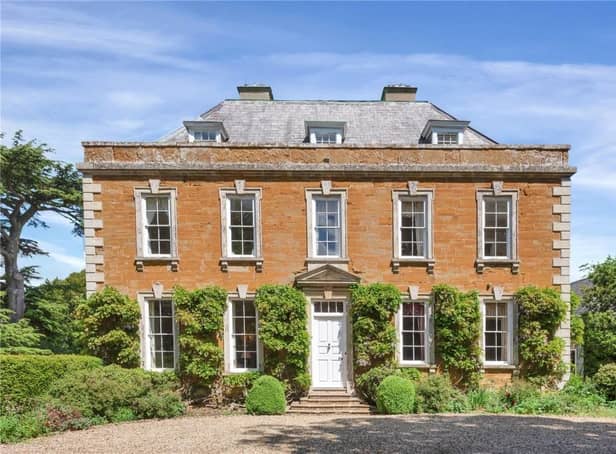 This historic home has traditional features throughout and rolling countryside views.