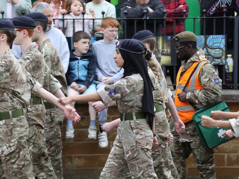 Kettering town centre: crowds line town centre to welcome The Royal Anglian Regiment for Armed Forces Day parade /National World