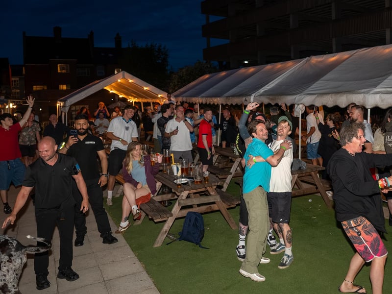 Football fans watching England vs Mexico in the garden of The Black Prince in Northampton. Photo by David Jackson.