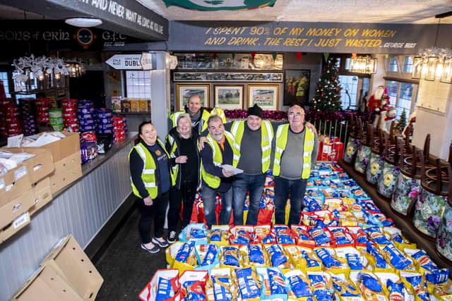 On Wednesday (December 14), The McCarthy-Dixon Foundation handed out more than 1,700 food parcels to a vast number of schools across the town. Photo: Kirsty Edmonds.