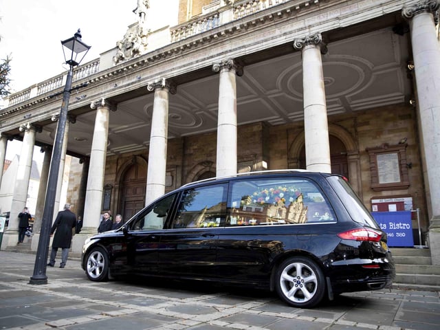 Hundreds gathered in the Market Square on Wednesday morning (December 7) to pay their respects to town legend Eamonn 'Fitzy' Fitzpatrick