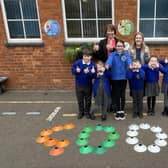Liz Crofts (Executive Headteacher), Rebecca Dunkley (Head of School) and children from Spratton Primary School celebrating their 'Good' Ofsted inspection result earlier this year.