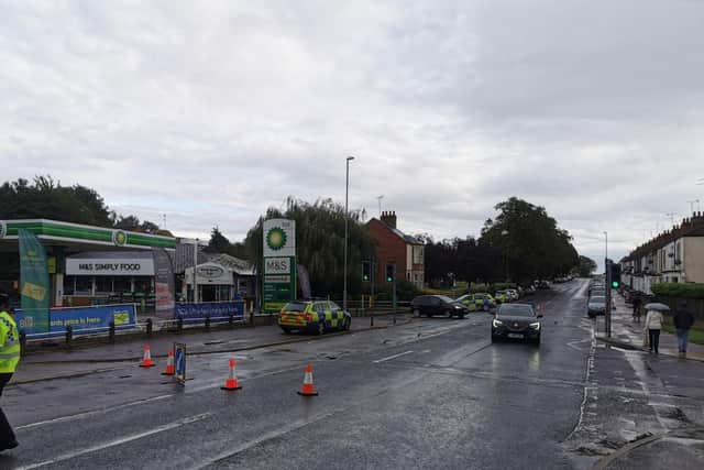 Harborough Road is cordoned off between The Old Five Bells and the BP garage.