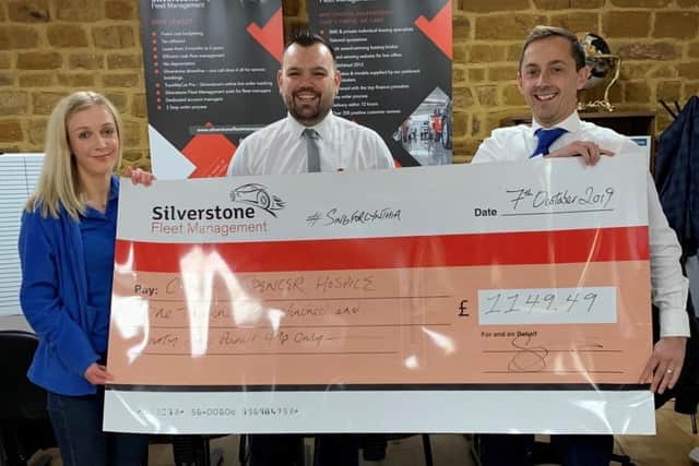 Silverstone Leasing’s Scott Norville and Ryan Bishop presenting a cheque to Cynthia Spencer Hospice’s Nina Gandy.