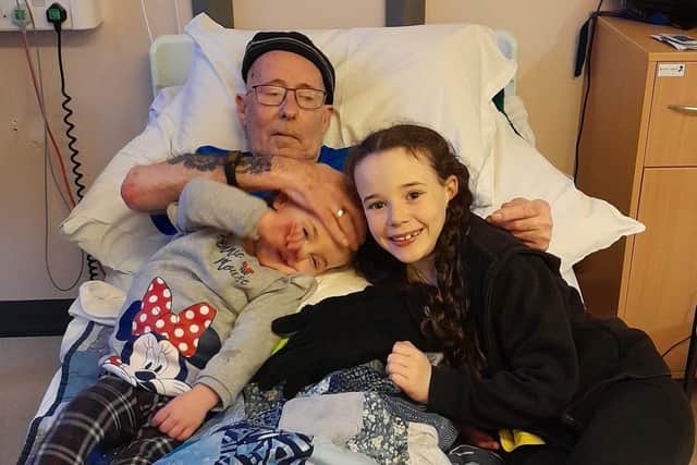 Dave Wellman with his granddaughters Cassidy and Frankie