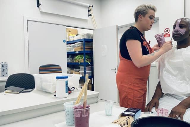 Poppy Twigger and Dr Nickey Hardy during the creation of the mask