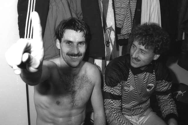 Dean Thomas celebrates alongside Peter Gleasure in the Rockingham Road changing room after the Cobblers' 1-0 FA Cup win in 1989 (Picture: Pete Norton)