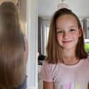 Lyla decided to let her older sister, who is a hairdresser, cut off seven inches of her hair to donate to children fighting cancer.