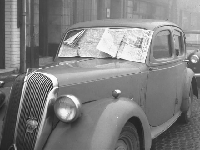 Standard car on a frosty day in Northampton. Headline reads: Cobblers' grand win over Palace. January 29, 1959