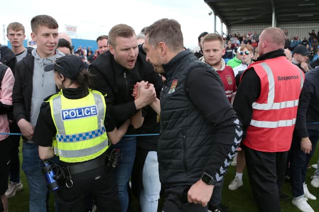 Jon Brady with fans after Saturday's game at Barrow. Picture: Will Matthews/PA Wire.