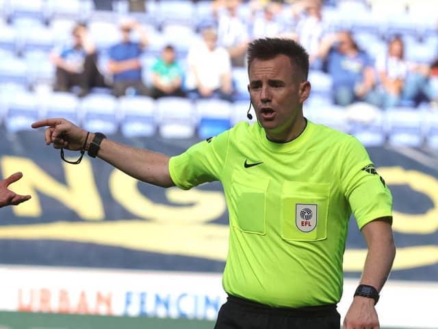 Referee Ross Joyce in action during the Sky Bet League One match between Wigan Athletic and Northampton Town at DW Stadium on August 12, 2023 in Wigan, England. (Photo by Pete Norton/Getty Images)