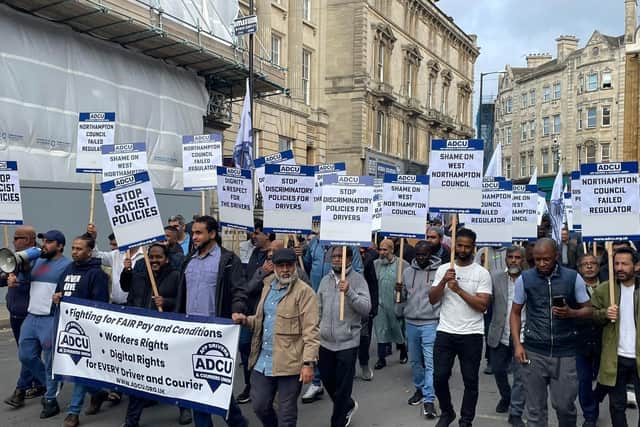 A union for taxi drivers has taken to the streets of Northampton to protest against "racist and regressive" regulations being voted on by West Northants Council.
Credit: ADCU