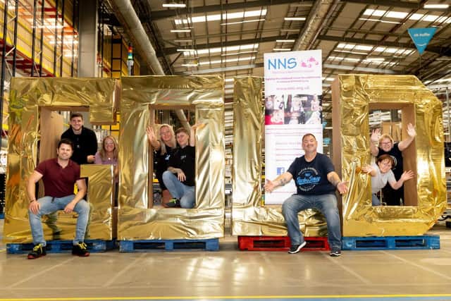Employees from Amazon in Daventry with staff and volunteers from Niamh's Next Step