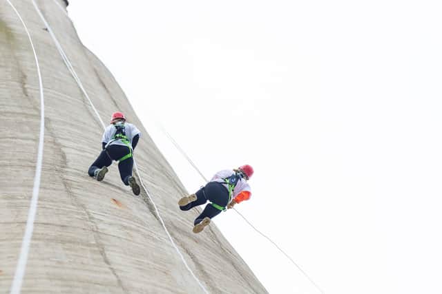 Participants abseiling down the Lift Tower.