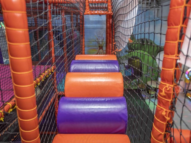 There is a new sensory room, car wash role play zone, two large ball pits with ball showers, and a sports court with astroturf on the top level.