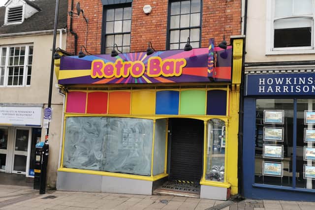 Retro Bar in Bridge Street has paint smeared across its front windows, making it look closed down. The owner declined to comment when approached by this newspaper.
