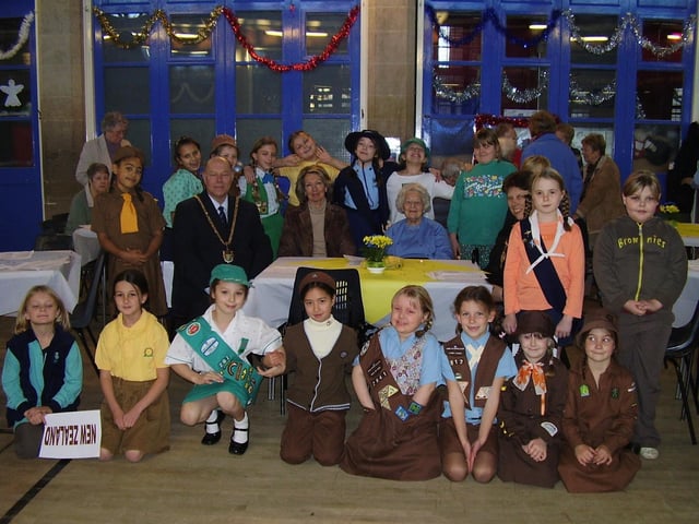 22nd Northampton Brownies celebrate 85 birthday - Picture shows the Brownies wearing Brownie uniforms from the 1960s through to the present day, from the following countries. Picture taken in 2006
