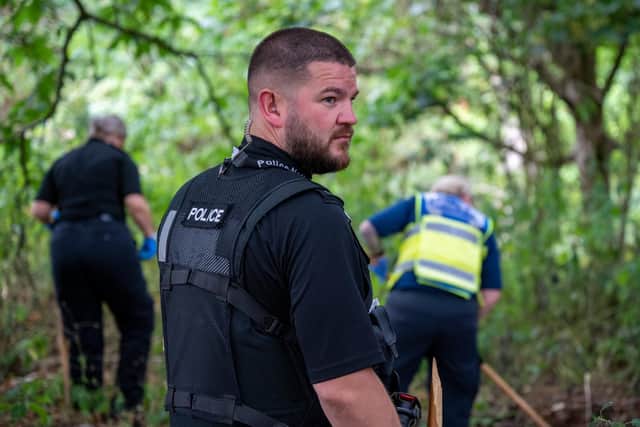 Officers recovered four knives and a baseball bat after conducting a painstaking search of Lings Wood, Northampton, on Tuesday