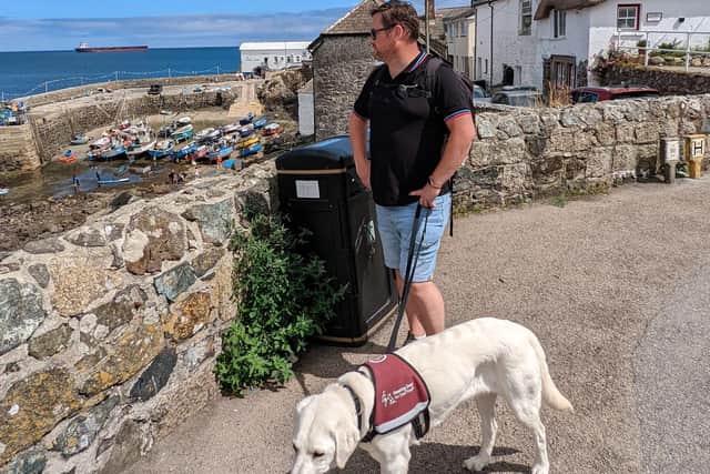 Ben Johnstone with Sophie the hearing dog