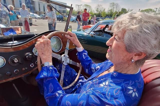 Brackley Care Home resident feeling what it is like to drive a "classic"