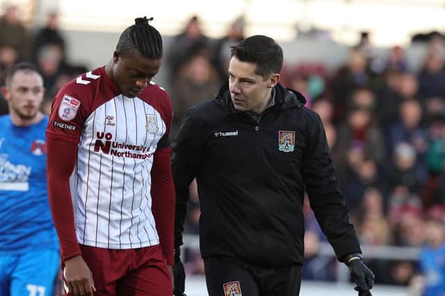 Cobblers' overworked physio Michael Bolger