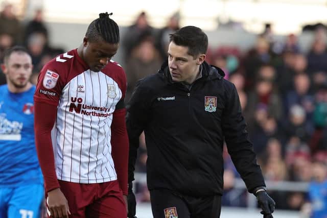 Cobblers' overworked physio Michael Bolger