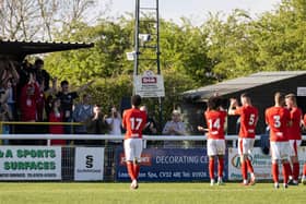 The Brackley Town players applaud the travelling fans after their goalless draw at Leamington on Good Friday. Picture by Glenn Alcock