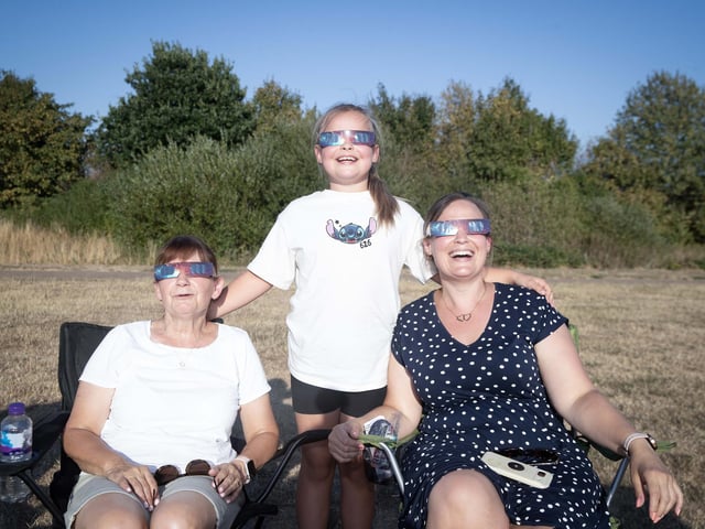 Families gathered at Upton Park on Wednesday night to watch the eclipse