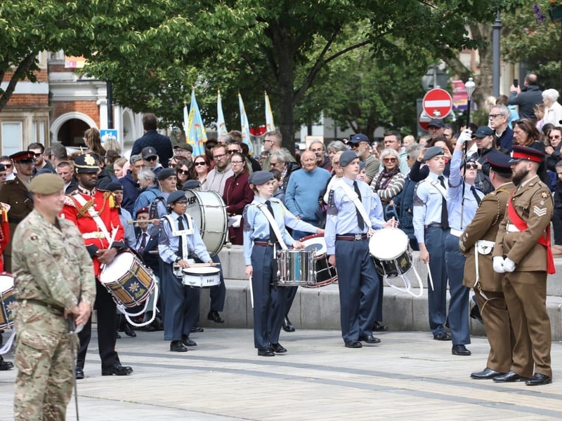 Kettering town centre: crowds line town centre to welcome The Royal Anglian Regiment for Armed Forces Day parade /National World