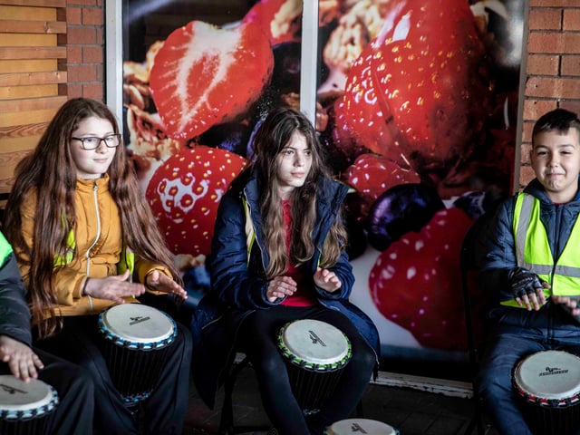 Abbey Primary School's choir and African drumming group took to Tesco Mereway on March 31, 2022 to raise money for the British Red Cross.