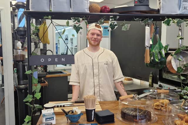 Cameron Creed is running the cafe inside the shop