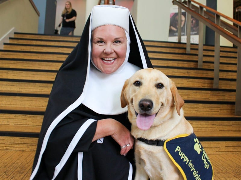Wendi Peters and guide dog puppy Coco