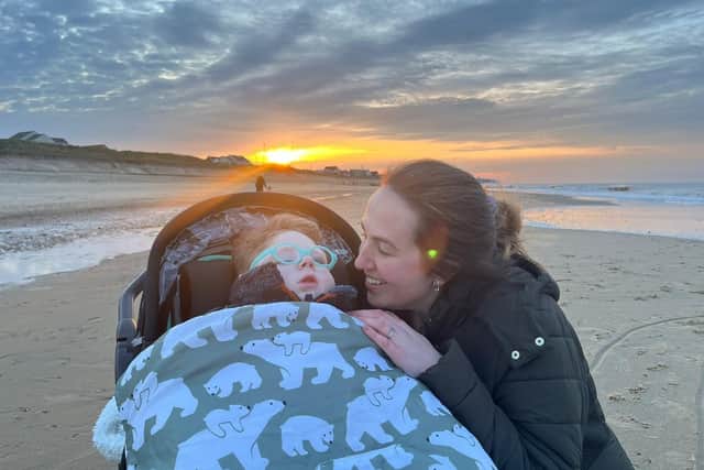 Teddy and Mummy on his first holiday in Bacton.