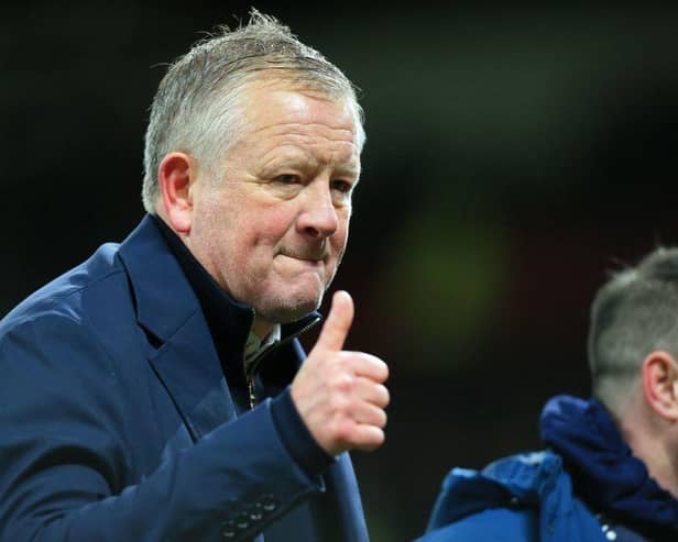 Chris Wilder gestures to supporters on the pitch after the English FA Cup fourth round football match between Manchester United and Middlesbrough at Old Trafford on February 4, 2022. (Photo by LINDSEY PARNABY/AFP via Getty Images)