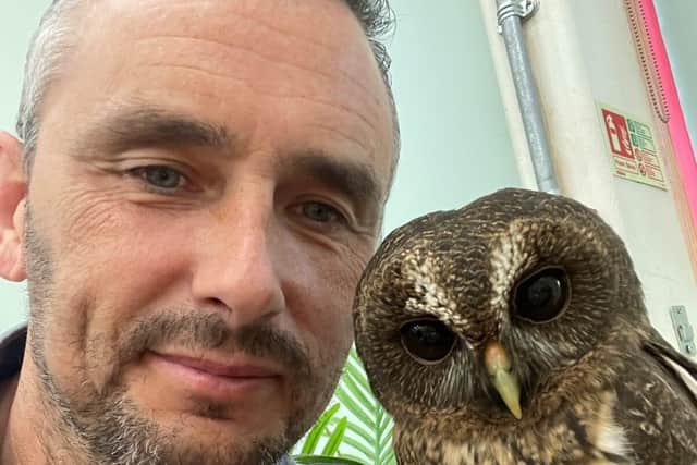 Jason with one of his owls.