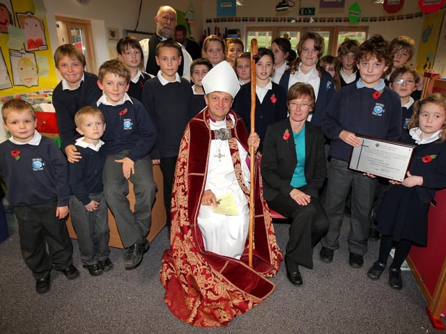 The Bishop of Brixworth dedicating the new classroom at Tiffield CE Primary School, followed by a tree replanting.