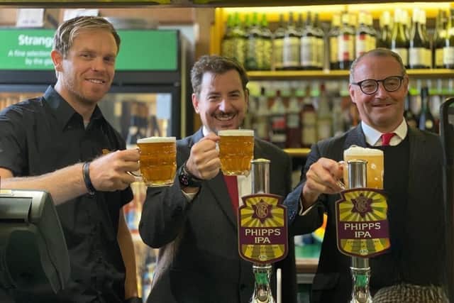 Mike Reader MP and Phipps Brewery celebrating the iconic beer being on tap in Parliament