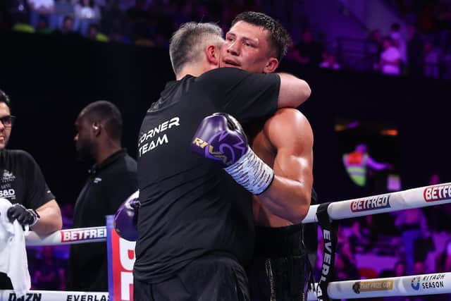 Trainer and dad James Conway embraces his son Kieron after his British title success (Picture: Mark Robinson / Matchroom Boxing)