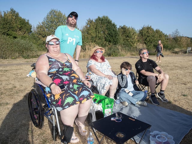 Families gathered at Upton Park on Wednesday night to watch the eclipse