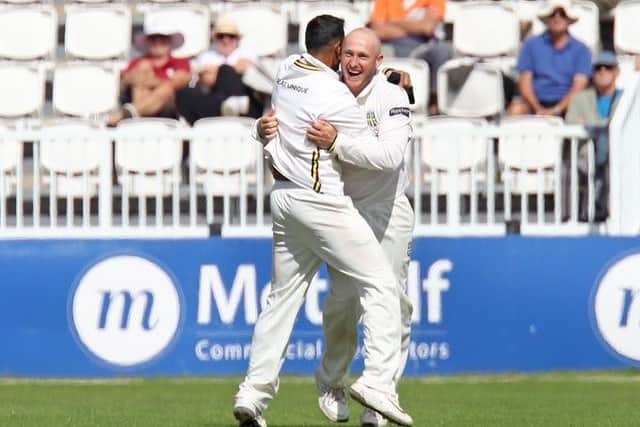 Callum Parkinson celebrates one of his six wickets (Picture: Peter Short)