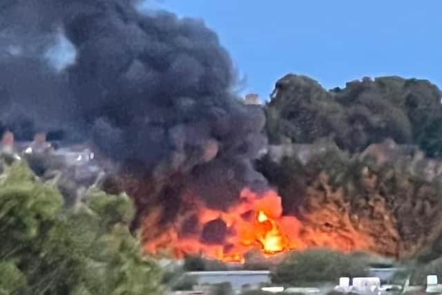 St Andrew’s Road is currently closed from the junction with Norfolk Terrace while firefighters deal with a large fire at a business unit. Photo: Aaliyah Watts.