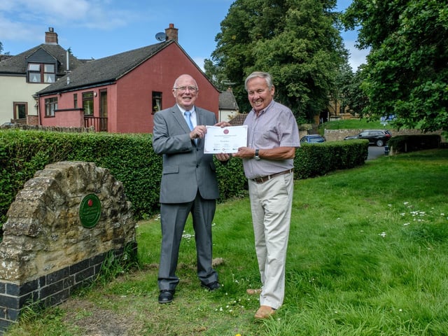 Councillor Malcolm Longley from West Northants Council presenting Richard Askew, a well-known community hero in Kingsthorpe, with a Rose of Northamptonshire Award. Lovingly nicknamed “Mr Kingsthorpe”, Richard Askew has served his local community for years in a range of roles spanning the local primary school, Scouts and charities. Each Christmas, Richard also sets up a full-size nativity scene to raise money for Northamptonshire Association for the Blind.