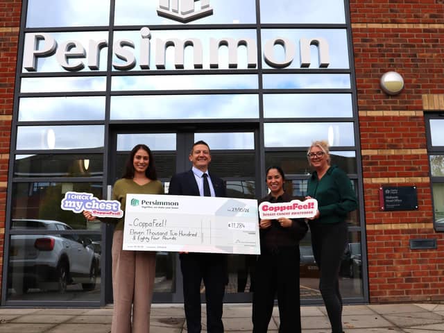 Persimmon Midlands and the team from CoppaFeel! receive the cheque at the Northampton office