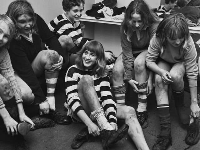 Players from the all-girl rugby team in the locker room before a training session ahead of their first match, a charity match against a local men's rugby team, at Daventry Mixed Youth Club in Daventry, Northamptonshire, England, November 1969. Aged between 13 and 16, the team was believed to be the country's only all-girl rugby team at the time. (Photo by Ian Tyas/Keystone Features/Hulton Archive/Getty Images)
