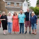 Millionaire street prize winners in Brixworth include (left to right): Philip Burton, Heather McIlhiney-Grant, Gillian Raygada, Emma Brennan, Jim Johnson, Jon Byrne, and Kim Pestell.