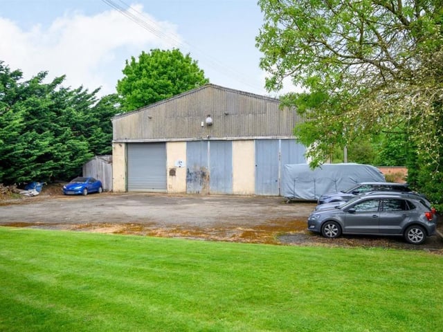 This Victorian home has a tennis court, huge gardens and a private mooring on the River Nene.