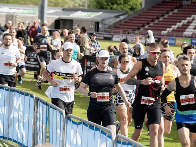 Hundreds of runners braved showers and wind to take on the race on Sunday (May 25), which started and finished at Sixfields stadium.