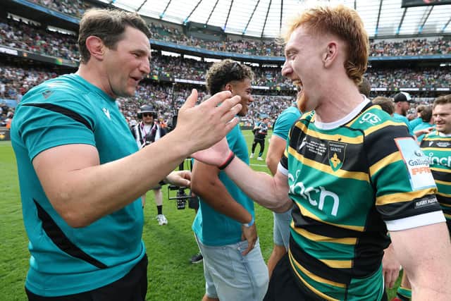 Phil Dowson celebrating with George Hendy after last season's Gallagher PREM final win (photo by David Rogers/Getty Images)