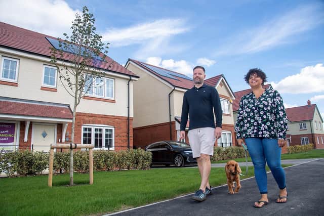 Kim Crichlow and Jason Hewitt outside their new house at Ashberry Homes’ The Wickets development in Desborough